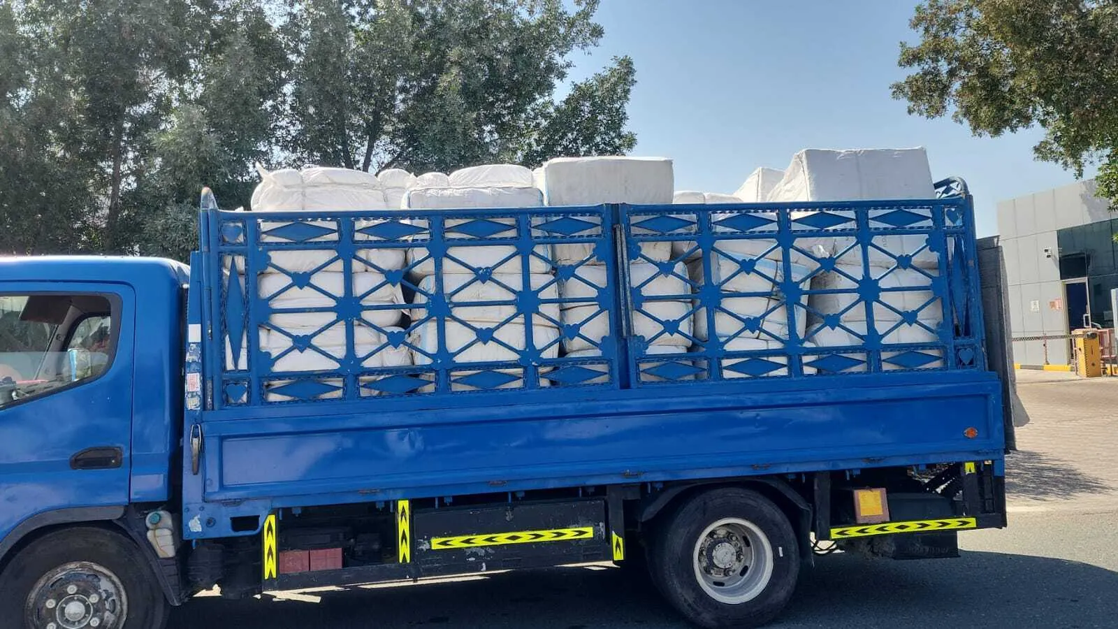3 ton pickup truck with tail lift loaded in Dubai